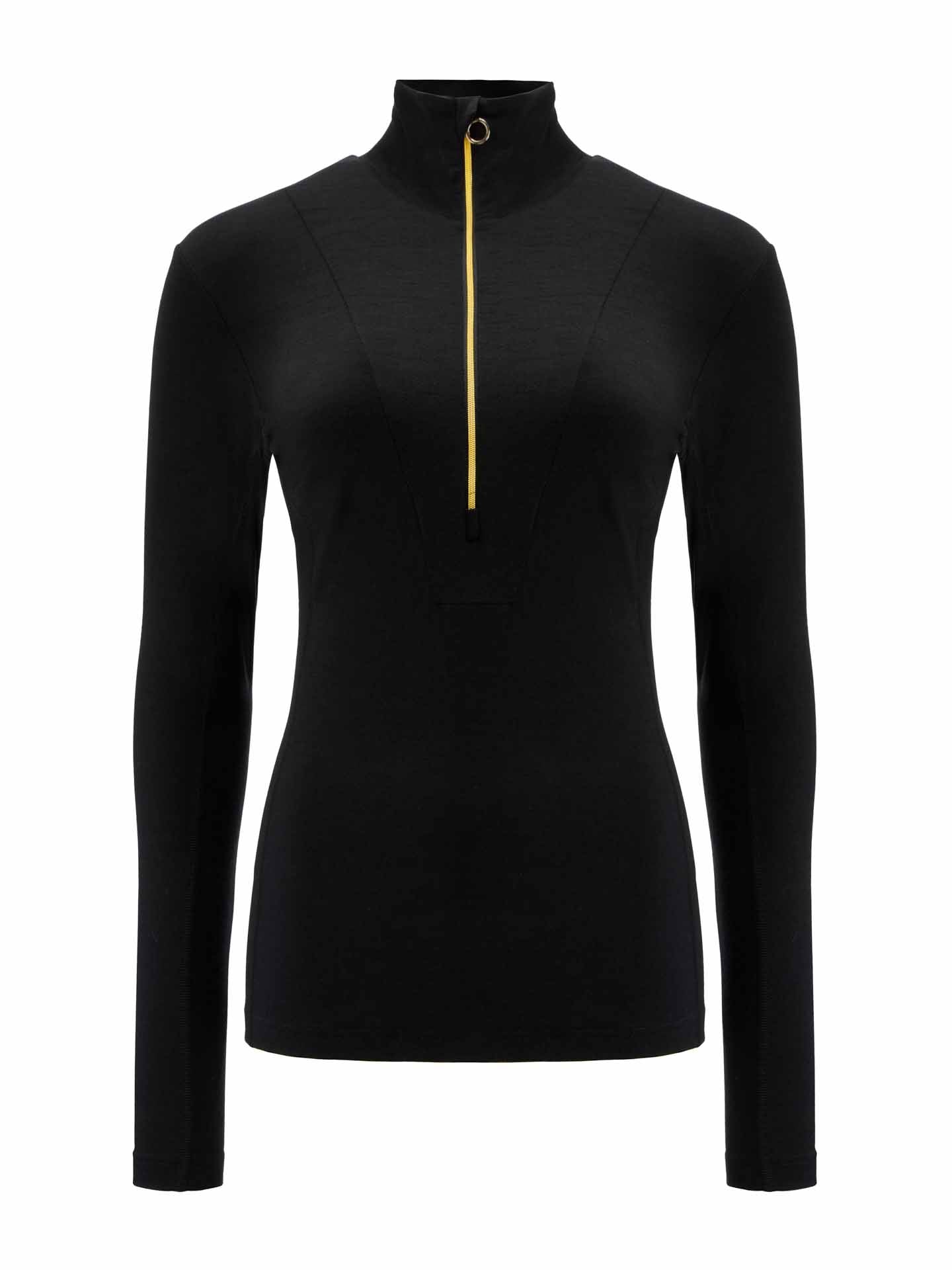 The We Norwegians Sno Merino Zip Up Women is a full-sleeved, black turtleneck shirt featuring a yellow front zipper. Made from super fine merino wool, this Scandinavian luxury base-layer boasts a sleek, fitted shape and high collar. The front zipper extends from the chest to the neck.