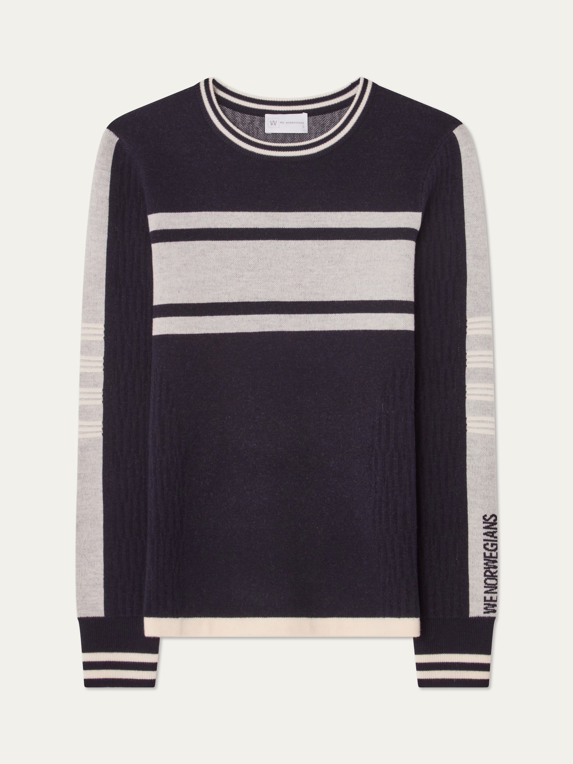 We Norwegians | FW25 | Womens Rocky Ski Sweater_Navy blue | A mid-weight knit designed in a retro style with a round neckline and contrasting color block panels on the chest and sleeves | Shot against an off-white background