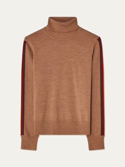 We Norwegians | FW25 | Womens Freebird Turtleneck Sweater_Cinnamon | A knitted turtleneck sweater with contrasting panels on the sleeves | Shot against an off-white background