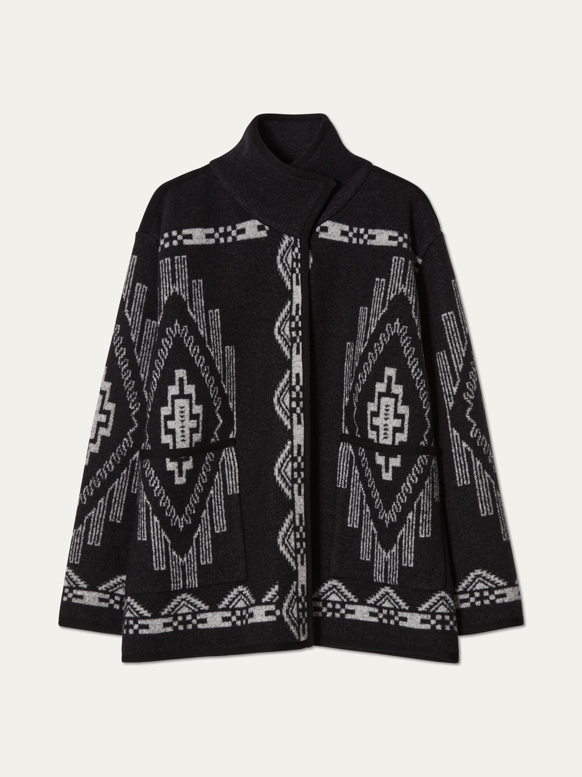 We Norwegians_FW25_Womens | The Kautokeino jacket in Black | The jacket come with a snap button opening and a striking jacquard pattern inspired by Native and Indigenous American art