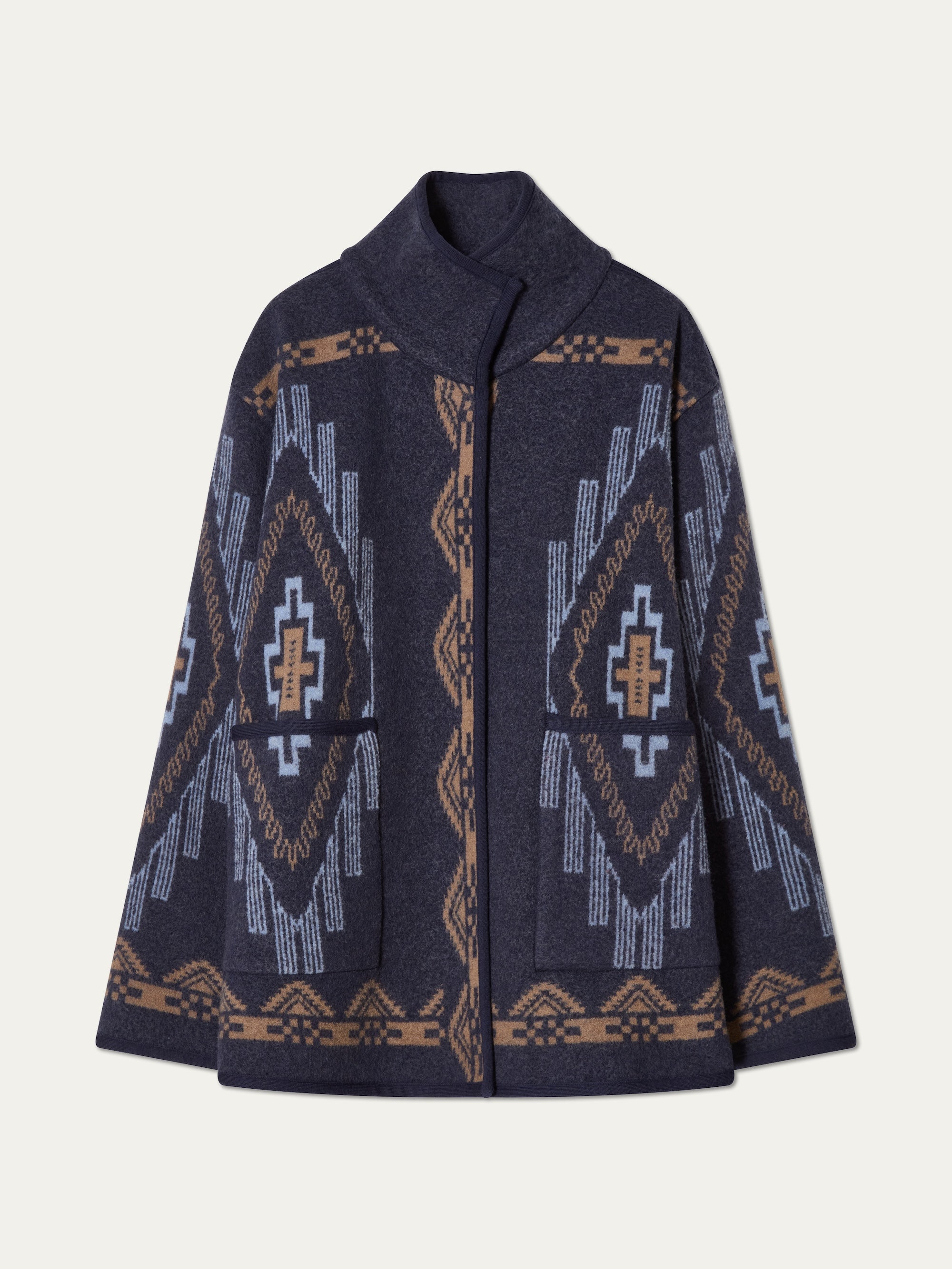 We Norwegians_FW25_Womens | The Kautokeino jacket in Navy blue | The jacket come with a snap button opening and a striking jacquard pattern inspired by Native and Indigenous American art
