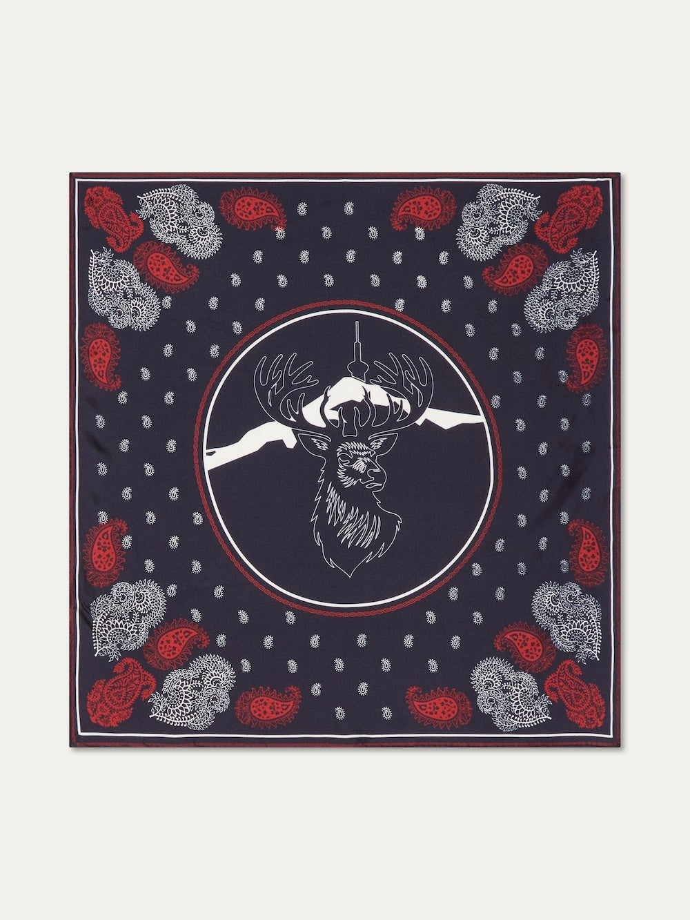 We Norwegians | FW25 | Western silk scarf_Navy blue | Printed with paisley patterns and a center stag motif | Shot against an off-white background